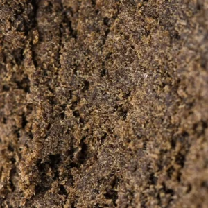 Macro van de Maroccan Hash 60% THCX, droge roodbruine korrel